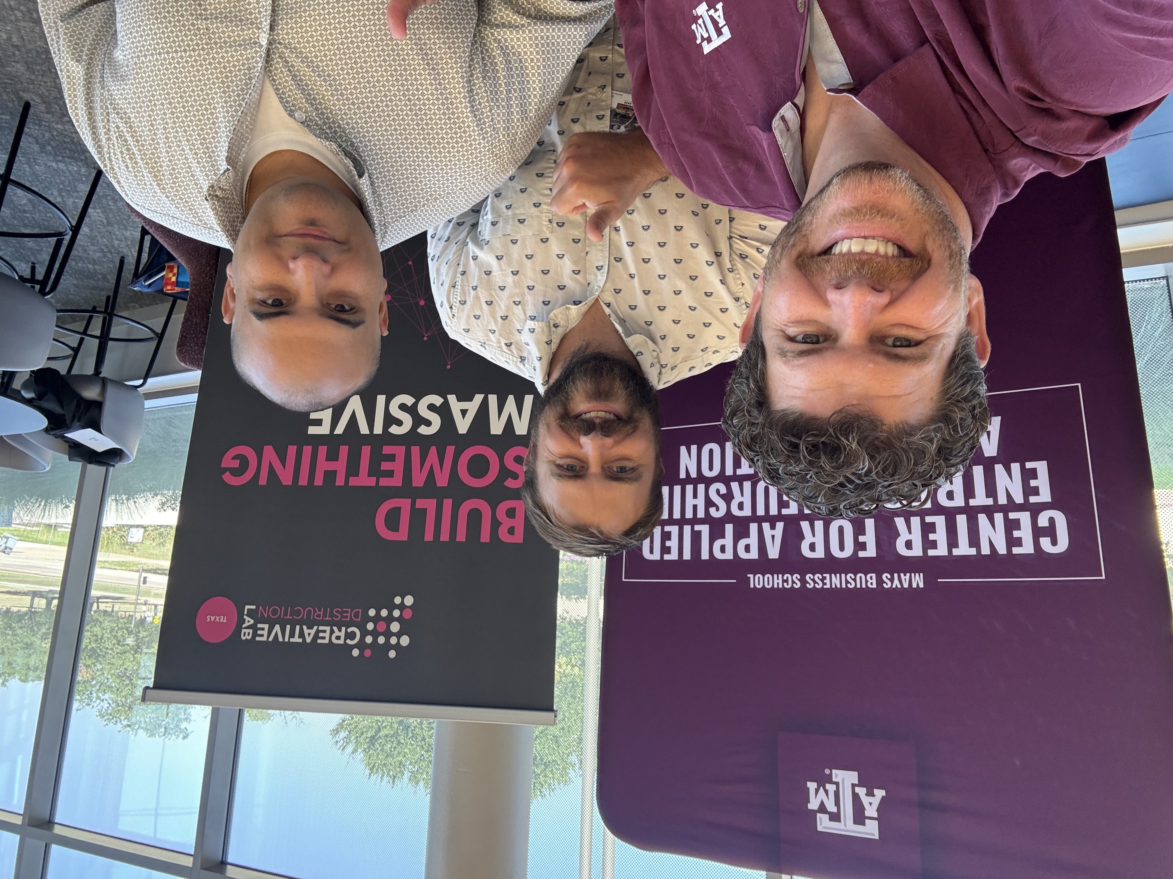 Dr. Levi Belnap and the CAEI team welcoming students at Texas A&M